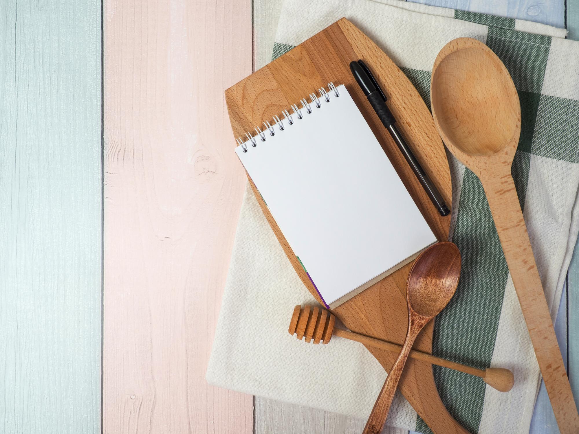 Flat lay of recipe cards and measuring spoons